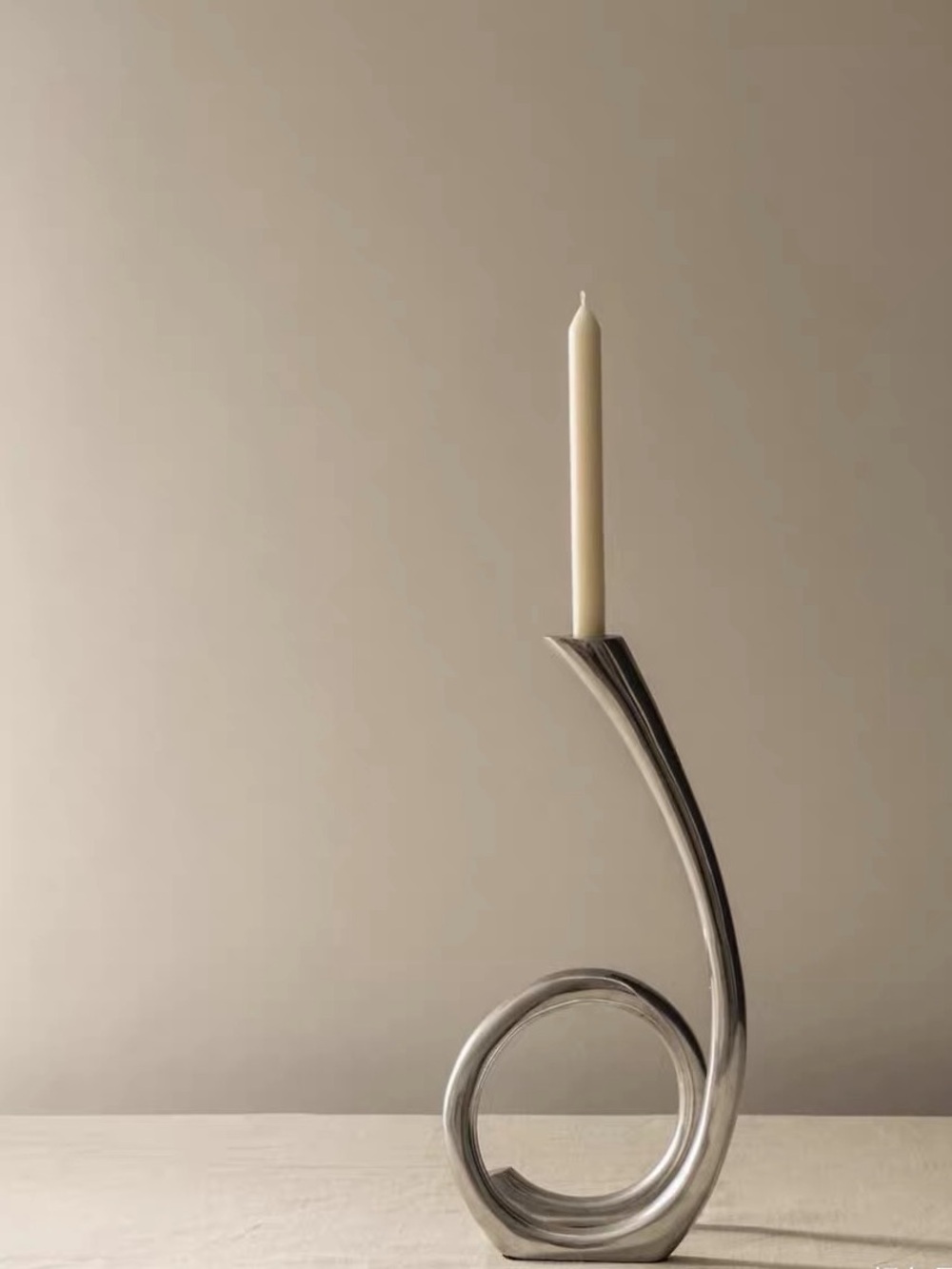 Vintage curly aluminum candle holder